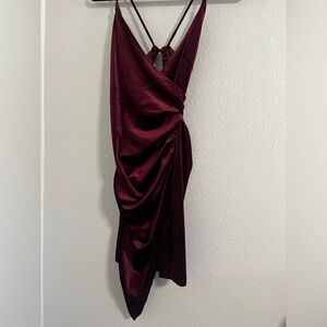 Thrifted burgundy velvet cocktail dress. Open back tied with a bow. 🎀